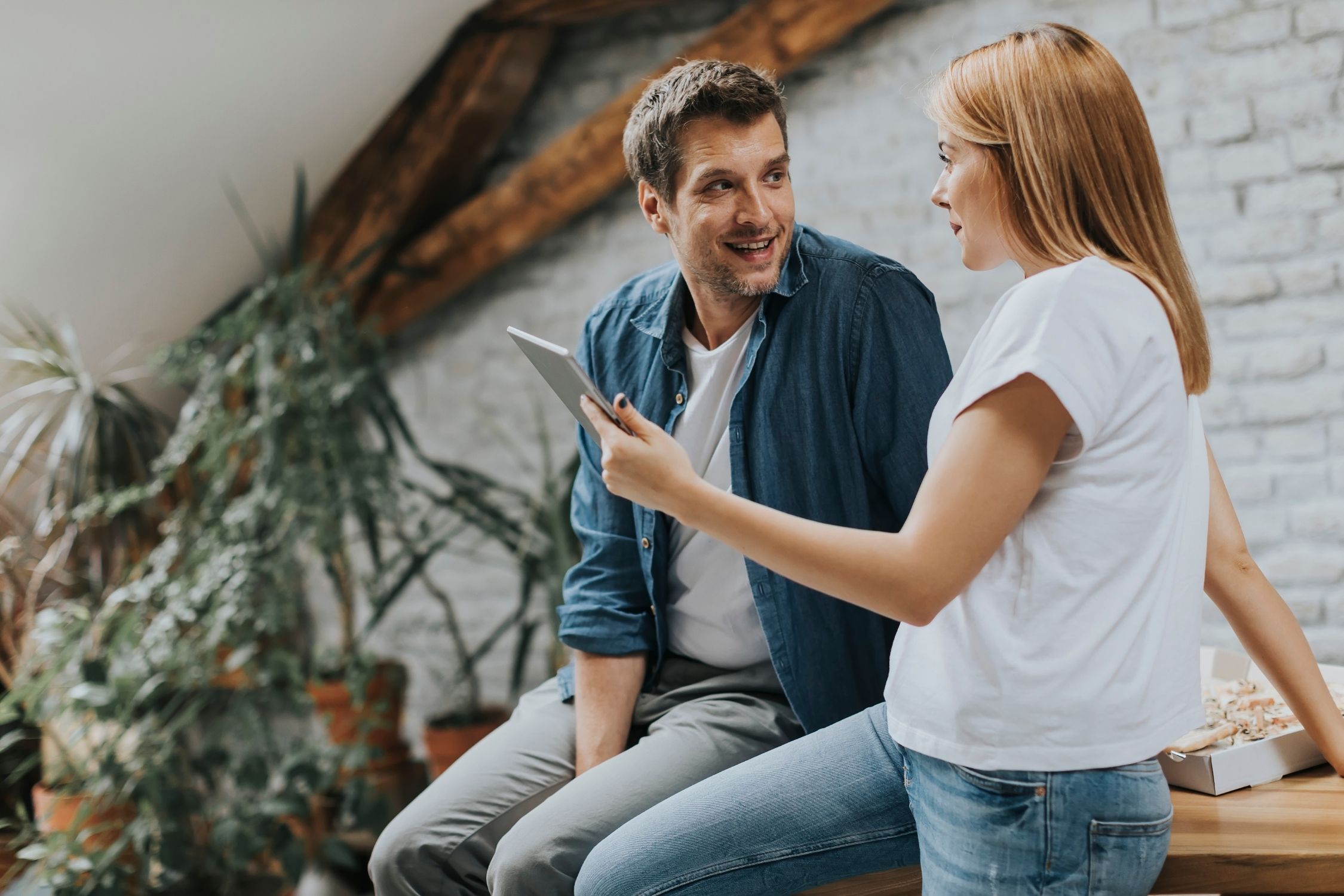 Couple participating in online therapy Couple participating in online therapy